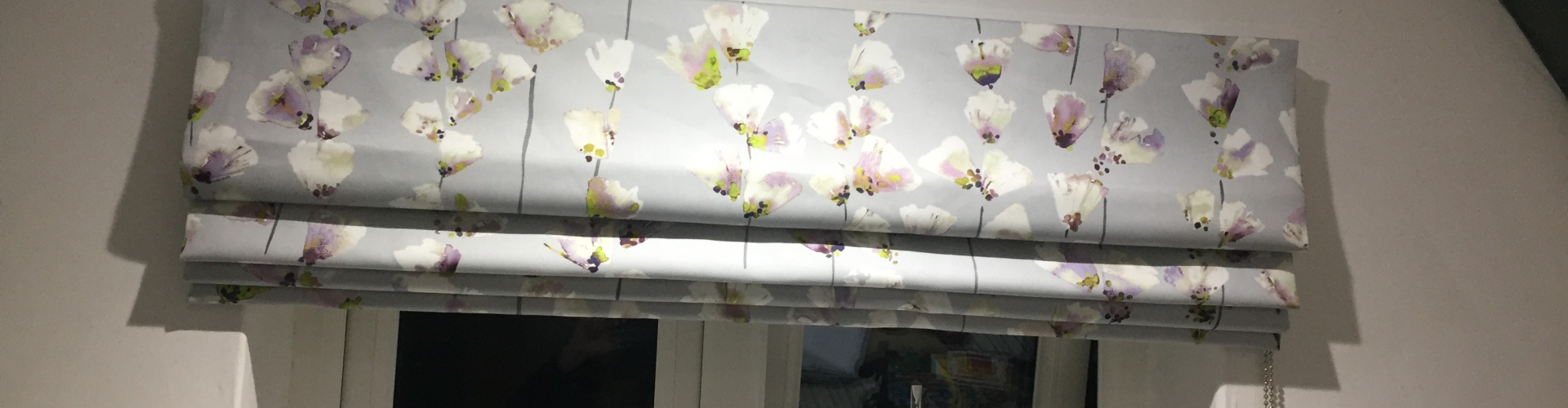 Silver floral window blind