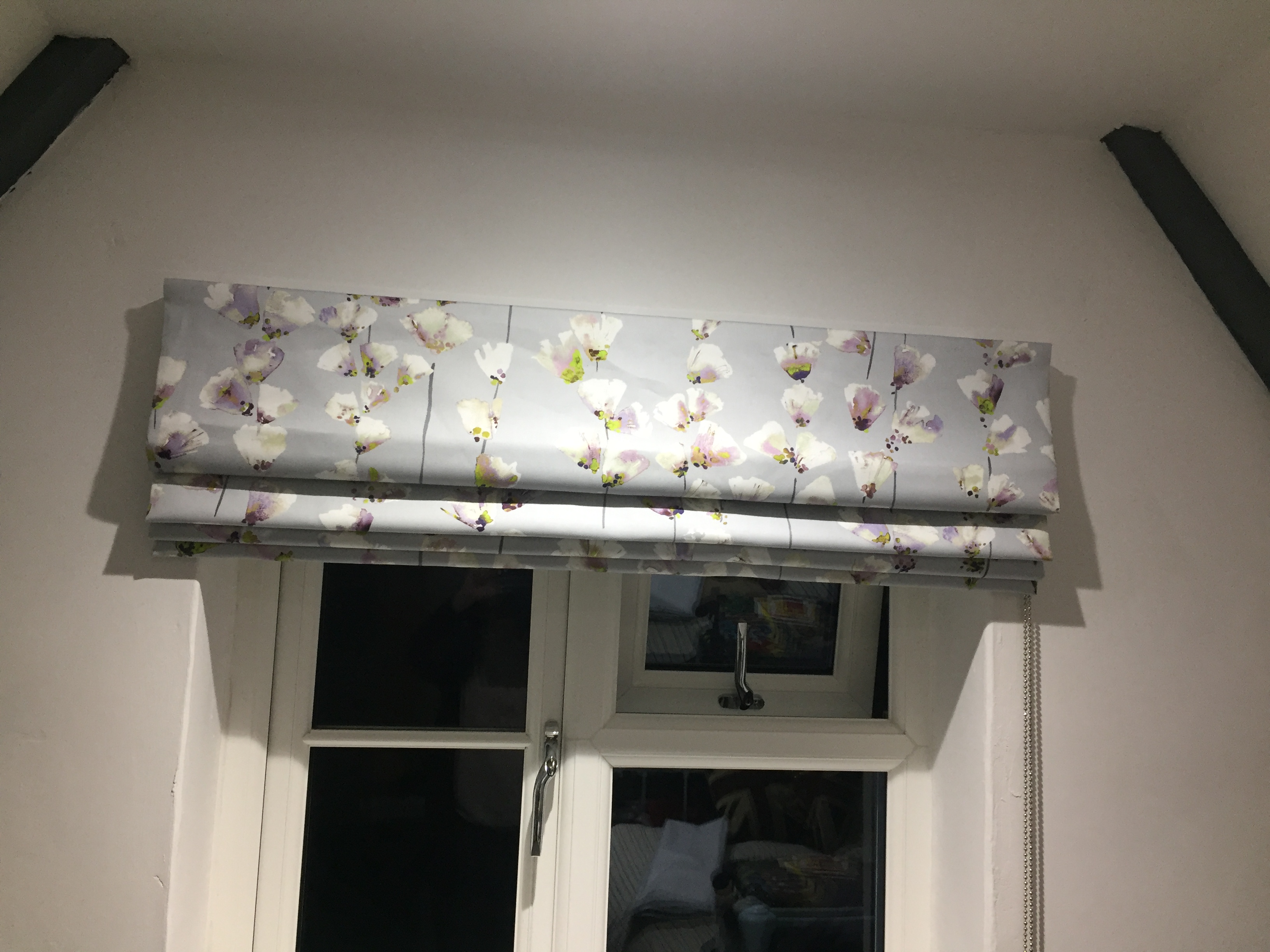 Silver floral window blind